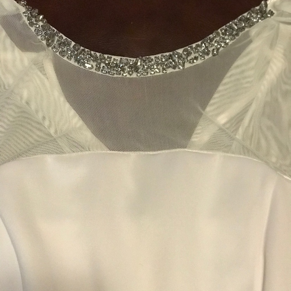 Beautiful cream jewel neckline dress!